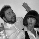 Joe and Paula singing waiters